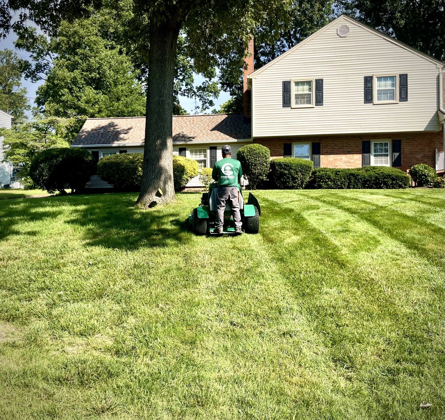 Crosspoint crew maintaining a residential lawn in Richmond